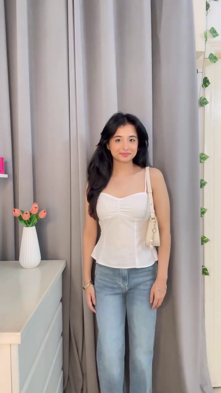 White Corset Top & Blue Jeans